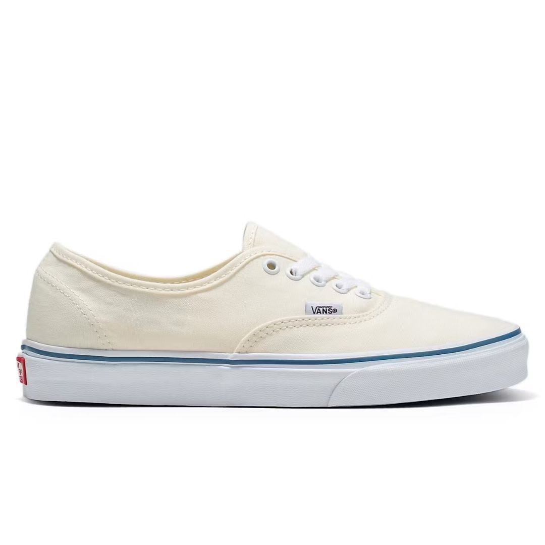white canvas sneaker, shown from the side against a white background